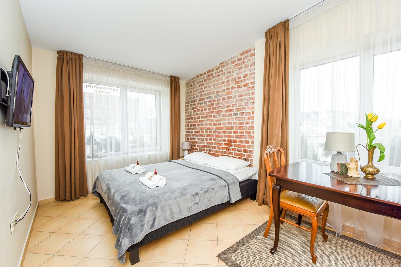 Kubu Apartment Клайпеда Экстерьер фото